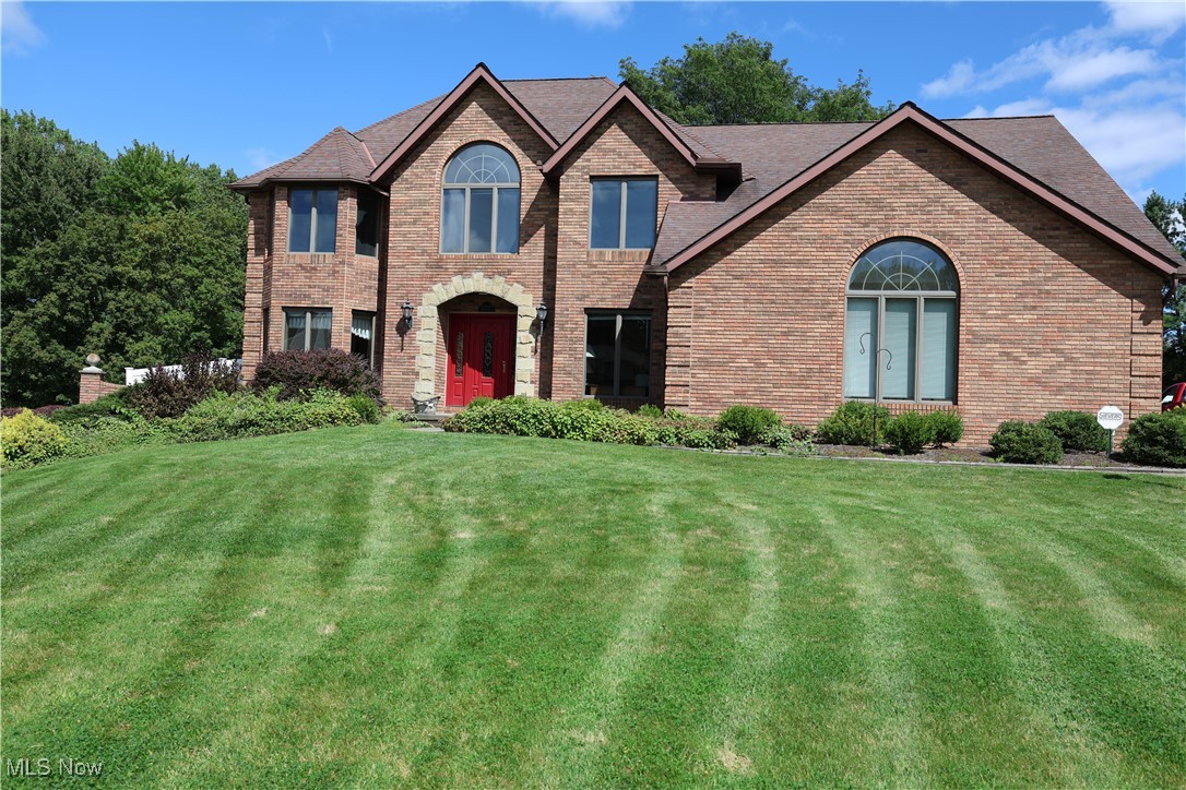 Welcome to this beautifully crafted 4-bedroom, 2.5-bathroom 2-story colonial located at the end of a cul-de-sac in one of North Royalton's most desirable neighborhoods! With its solid brick structure, lush landscaping, and spacious 3-car garage, this home delivers instant curb appeal, blending comfort, elegance and functionality. First floor features a half bath and a den/office with crown molding and wainscoting. The formal living/dining room exudes classic style with crown molding and a tray ceiling. The stunning eat-in kitchen is an entertainer's dream, boasting magnificent solid oak cabinetry, recessed lighting, large pantry, and an oversized island with seating. The vaulted sunroom-style kitchenette with skylights adds extra space for morning coffee or family meals. The cozy family room off the kitchen features vaulted ceiling, a gas brick fireplace, and skylights. A first floor laundry room has a leaded glass door leading into the kitchen. On the second floor, all four bedrooms are generously sized and full of natural light, including a gorgeous primary suite, complete with a bay window, vaulted ceiling and a spa-like en-suite bath featuring dual vanities, a jacuzzi, a private shower, and spacious walk-in closet. There is also a full bathroom with a tub/shower combination and an extra-large bonus room with vaulted ceiling that can be used as a TV/playroom. The large unfinished basement has a workshop and double utility sink. Backyard has a large paver patio, garden and concrete pad. **House features ample storage space, a whole house Generac generator, central vacuum, rain bird sprinkler system, gutter guards, casement Andersen windows with built-in blinds, privacy fence with gate, and a Sievers security system.** All appliances stay.** Furnace, generator, AC, and central vacuum professional serviced in April 2025.** Carpet has been cleaned.** This home is perfect for anyone looking for space, comfort, and a serene setting! **Schedule your showing today!**