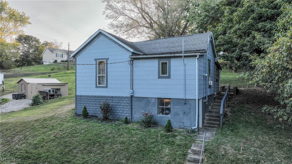 Photo of 306 Monroe Street, Woodsfield, OH 43793 (MLS # 5179069)