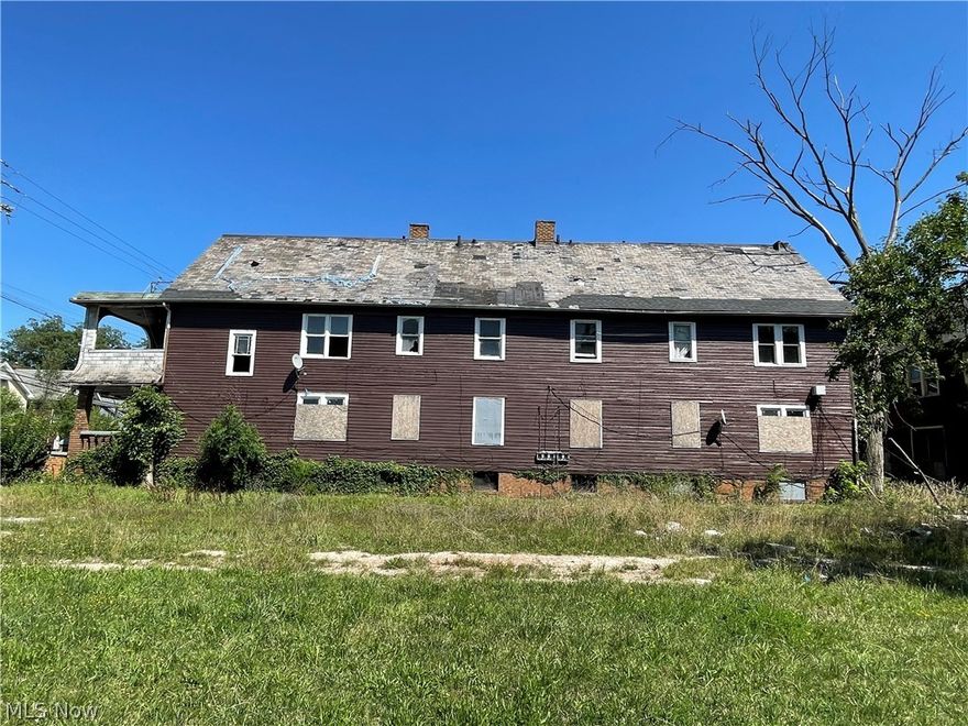 Investors great opportunity to purchase six units for under 100k. 2 bedrooms 1 bath in each unit. 15 minutes from downtown Cleveland. 2 properties on one parcel. Four unit building and a 2 unit house behind. vacant lots on each side owned by the city, property needs full rehab.