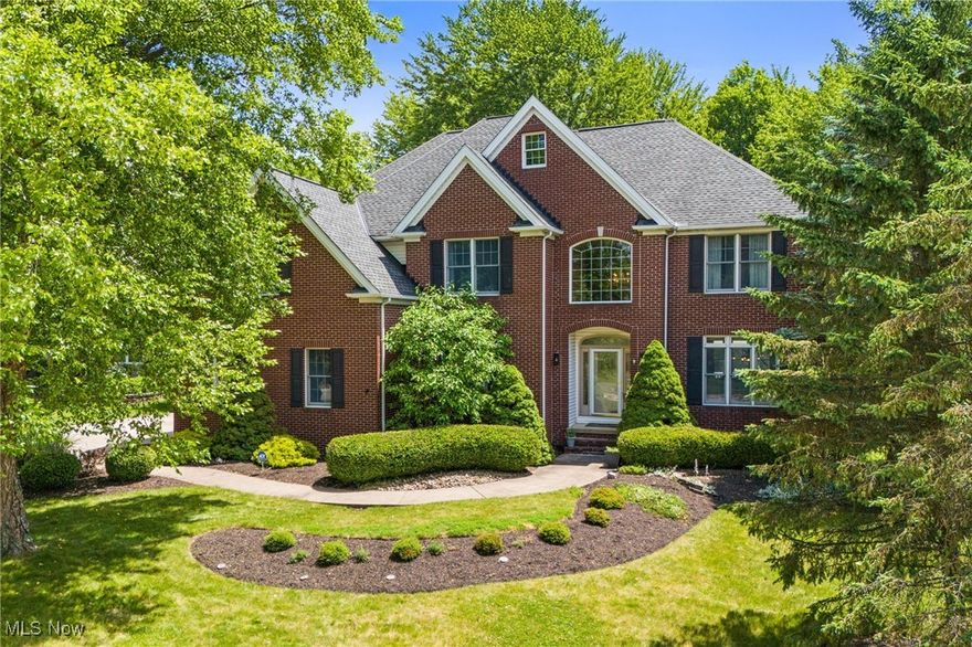 WHAT A STUNNING HOME! Prepare to be in awe as you step into this gorgeous 4 bedroom, 4 bath move in ready colonial in Broadview Heights. From the soaring ceilings to the dual staircases leading to the second level, every detail invites you in. The dining and sitting rooms complement each other beautifully with LVP flooring, raised ceilings, and crown molding, perfect for both entertaining and every day living. Just off the entry is a flexible space ideal for an office, playroom, or rec room, along with a beautifully updated first floor half bath. The open concept kitchen features LVP flooring, granite countertops, a large island, and a tile backsplash overlooking the spacious living room and built-in sunroom. Upstairs you’ll find two generous bedrooms that share a Jack and Jill bathroom, while a third bedroom includes its own private full bath. Open the French doors to an impressive primary suite, complete with its own fireplace, extensive built in counter space, two walk-in closets, and a spacious primary bath ready for your finishing touches. The finished lower level, complete with egress windows, provides abundant extra living space. Step outside through either sliding door to a fully fenced backyard oasis featuring a large deck, concrete and brick patio, gazebo, fire pit, and Koi pond. Imagine summer nights grilling out and enjoying time with great company! This home offers the perfect blend of thoughtful design, flexible living space, and an exceptional backyard setting ready for relaxing and entertaining. Don’t miss the opportunity to experience all it has to offer - schedule your private showing today!