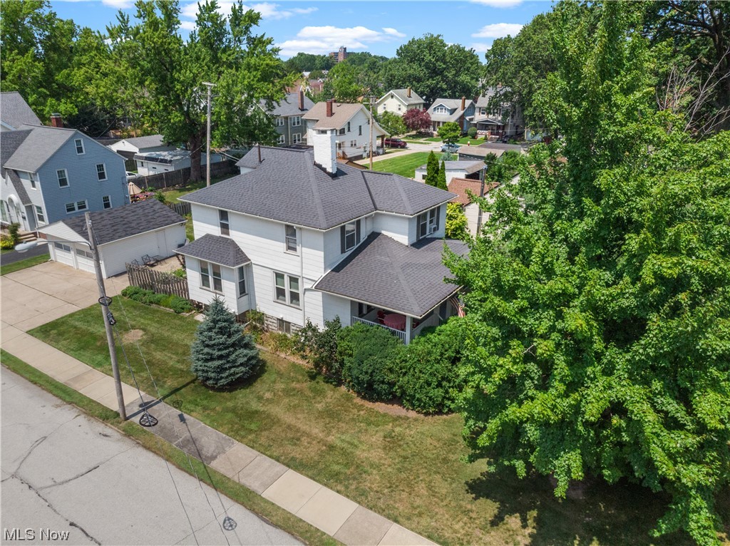 Updated charming duplex situated on a spacious lot with a large, relaxing front porch. Inside you will find a very well maintained living space on both levels making this a turn-key property. The first floor unit comes fully furnished, perfect for an owner occupant to move right in or to be used as an AirBnB / rental available to start producing cash flow immediately. The first floor unit has beautiful hardwood floors. Both units have access to their own washer and dryer, as well as 2 bedrooms and 1 bathroom. Each unit is designed to provide privacy and comfort with private entrances, many built-ins and plenty of storage. There is a third floor for extra storage that can be turned into usable space down the road. An oversized concrete driveway and a two car garage has enough parking for six vehicles. Property is located in Lakewood, a vibrant suburb of Cleveland offering both a beautiful neighborhood along with easy access to urban amenities. It is known for its tree-lined streets,
