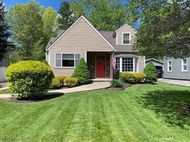 Absolutely amazing and immaculate! If you are looking for a home that won't need any money poured into it, you have found the one. The lawn and back yard are meticulously landscaped, ready to enjoy an evening outside on the decorative brick patio. Inside you will find beautiful wood floors thru much of the first floor, and an absolutely amazing finished basement with a full bathroom! The kitchen is delightfully updated with ceramic tile and has a breakfast nook behind a arched ceiling from the kitchen. Upstairs is a large bedroom with a large walk-in closet. The entire home is tastefully painted and is truly "move-in ready". So many newer features come with this beauty...The siding is about 10 years, and the roof about 7-8 years young. The furnace and air are only about 7-8 years as well! Visit this home as soon as you can....it truly won't last.