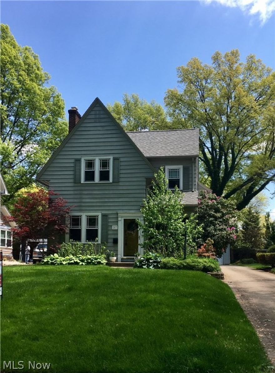 Exceptional colonial on one of West Akron's most desirable streets! This spacious home offers a living room with fireplace and stunning moulding, a charming sunroom, a formal dining room and a large light filled family room just off the kitchen, perfect for gathering. A half bath finishes the first floor.  Upstairs you will find a huge master bedroom, boasting a dressing room and an updated full master bath.  Adjacent to the master is a perfect nursery or office. Down the hall you will find a guest bath and two additional very spacious bedrooms with excellent closet space. A full basement with great storage and a work shop. Wave to your neighbors from your cozy screened in front porch, or enjoy the serene back yard from the back deck and covered porch.    This home has a new roof (2015), newer carpet in the master, newer concrete drive, updated electrical and plumbing, many replacement windows and a large 2 car garage. This home offers all the charm and character of yesteryear blended