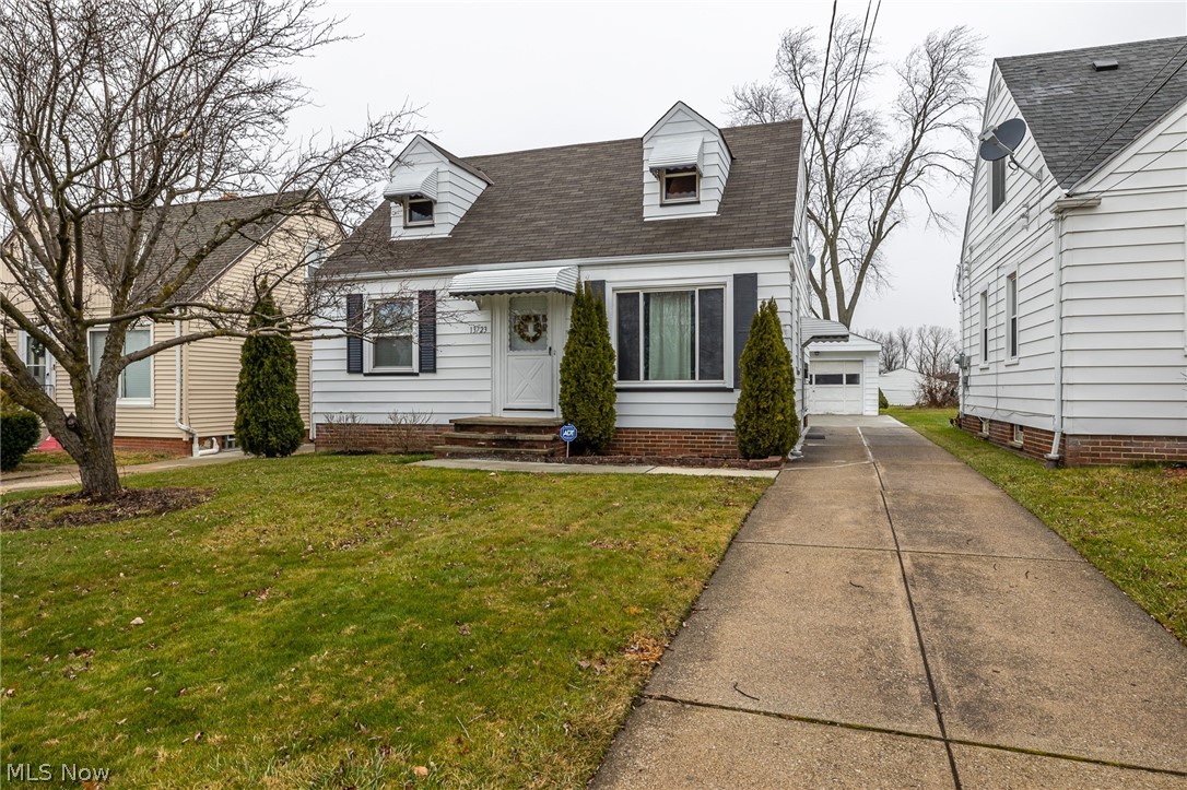 Nicely located Cape Cod on a deep lot that has been pristinely cared for for many years. Walking in, you'll walk in-to the large living room with newer carpeting and plenty of natural light. Off of the living room is two generous sized bedrooms with gleaming hardwood flooring and a recently updated full bath. Rounding out the first floor is the kitchen with oversized upper cabinets to give you the extra storage space you need. On the second floor is a huge bedroom that extends most of the home. In the lower level is a huge rec room that was remodeled in 2016 and the laundry and utility area that provides additional storage should you need it. Outside you'll find a garage, shed, and huge back yard with plenty of greenspace to entertain or let kids run around. This home has an abundance of updates including: Exterior paint on house, shed, and garage 2022, electric panel 2021, rear driveway pad 2021, roof on house and garage 2018, carpeting 2019, glass block windows 2016, and vinyl replac