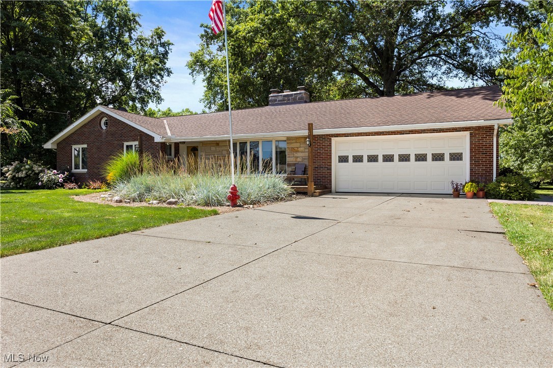 Welcome to your own slice of country comfort with all the modern conveniences! This charming all-brick ranch has 3 bedrooms and 2 full baths, all on one level for easy living. The heart of the home is the kitchen, complete with granite countertops and a large sit-down island—perfect for morning coffee, quick meals, or gathering with friends. Just steps away, the dining room fireplace adds warmth and charm, creating a cozy place to linger over dinner. The sunroom offers the best seat in the house to watch backyard wildlife and changing seasons, all while staying out of the elements.
Outdoors, this 3.44-acre property is a dream. Relax on the welcoming front porch, host summer cookouts on the 23’ x 16’ composite deck, or enjoy peaceful evenings on the stamped concrete patio. Cast a line in your own pond, start that garden you’ve always wanted, or simply let the kids and dogs run free with plenty of room to roam.
For hobbies, projects, or big toys, the 42’ x 60’ pole barn is a game-changer, with a concrete floor, high 13’ overhead door, and plenty of space for an RV, workshop, or extra storage. Add in the full basement, attached two-car garage, and the upcoming connection to city sewer, and this home has the comfort, space, and extras you’ve been waiting for.
If you’ve been searching for a home that combines everyday ease with outdoor living and room to breathe, this one checks all the boxes.