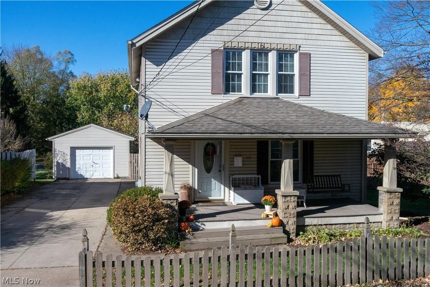 Wow! Exceptional Ravenna colonial completely move-in ready! Hard to find 3 bedroom, 2.5 bath, 1.5 garage home with finished basement offering 2 additional rooms perfect for office, school, or flex space - plus a kitchenette and half bath! Enjoy quiet evenings on the southern style front porch, complete with swing - and spacious full fenced backyard with wooded views, oversized deck for entertaining, and a paver patio w/fire pit! Bright entry foyer w/ceramic flooring offers a large mud/coat area, opening into a tastefully decorated living and dining room featuring luxury plank flooring and crown molding.  Beautiful updated kitchen w/newer cabinets, counters, pot rack, and all appliances - perfect for the gourmet chef! The main level is completed with a full bathroom w shower, and 1st floor laundry! Upstairs find a huge master bedroom w/crown molding, large updated full bathroom w/jetted tub, and 2 other niced sized bedrooms - all with hardwood flooring. Finished basement offers tons of