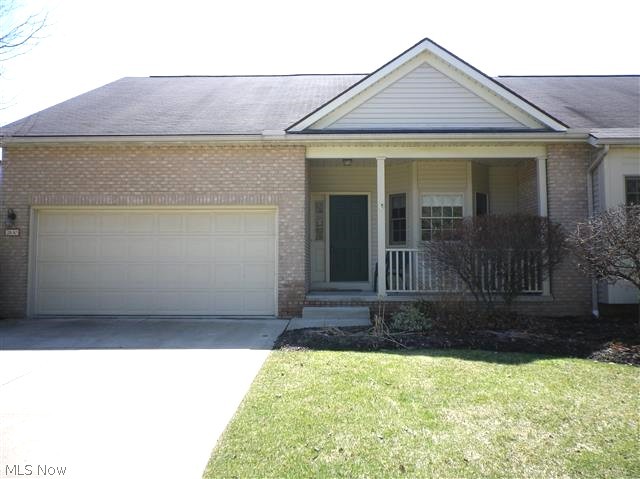 Bright & sunny-updated condo with golf course views. Updated eat-in kitchen offers ceramic tile floor, granite counter tops & glass & stone backsplash. 2 story fireplaced Great room with beautiful views. Sun room/family room accesses covered deck. 1st floor master offers bath suite with jetted tub & separate shower. 2nd floor is the location for the 2nd bedroom, 2nd full bath & loft over looking Great room. 1st floor laundry, 2 car garage & partial basement.