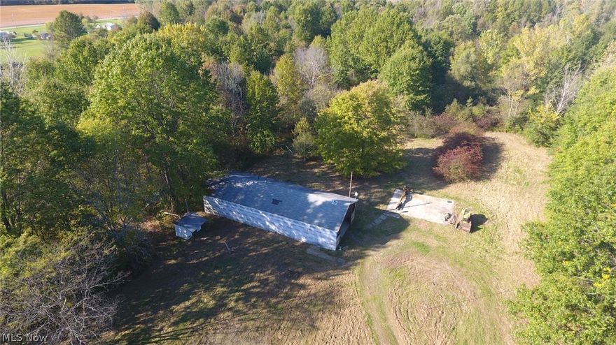 Fantastic opportunity awaits! Are you looking for a property that already has a driveway cut? A well? A septic? An outbuilding? A shed?  A pond? Well here ya go! Total privacy with this property!  The old location of the previous home sits approximately 400 feet off of the road.  All you need is your new home here! Maybe a contemporary ranch or a manufactured home! Endless possibilities! Mineral rights will transfer with an acceptable offer!  There is an additional concrete pad that would have housed a 24x20 garage.   Extra bonus is the small pond on your property! Who doesn't love  a water feature!