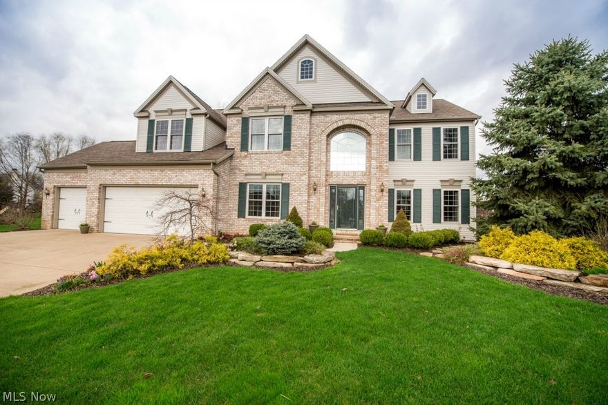 SPECTACULAR home nestled on a 1/2 acre cul-de-sac lot; with all the recent updates you couldn't build this home today at this price! The 2 story foyer has been updated w/beautiful, Natural Walnut Floors that flow into the Formal Dining Room, Living Room & the 1st flr office. The impressive 2 story Great Room has a gas fireplace flanked by palladium windows providing lots of natural light & is open to the Gourmet Kitchen that's a chef's delight w/updated Granite Counters, Peninsula Island, newly stained cabinets, ceramic floors & ALL kitchen appliances stay! The newer 4 season rm adjacent to the kitchen is perfect for entertaining! A 1/2 bath & laundry room complete this level. Dual staircases provide access to the 2nd level from the foyer or the laundry room area; so convenient! The Outstanding Master Retreat awaits you upstairs w/an impressive spa-like, renovated, private bath! 3 additional spacious bdrms share an updated full bath. Owners finished the basement w/a 30x24 rec room & ye