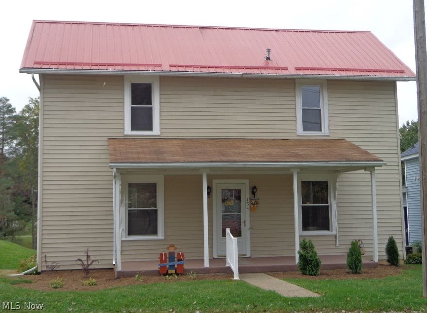 This is a move-in ready renovated home. New kitchen, appliances, bathroom, light fixtures, floors and ceilings. The living room is the only room that does not have new carpet and drywall. Walls were taken out for an open concept in the kitchen area. Not only was the bathroom redone, it was re-arranged for a better flow. Stairs were widened. New landscaping in the front yard. Metal roof on the main home, asphalt shingles on the front and back porch. Replacement windows, furnace and air conditioner replaced in 2006. 200 AMP. Vinyl siding. Inviting front porch.