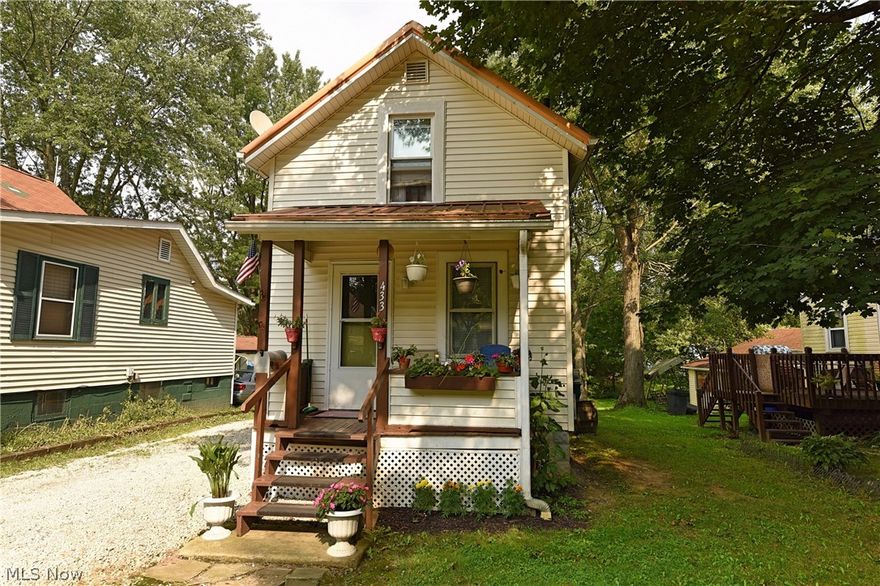 Nicely remodeled two-story in downtown Ravenna.  New kitchen cabinets, flooring, countertops and appliances.  An Addition of a bedroom, full bath, and laundry room on the first floor.  Second story with a second bedroom and a full bathroom.  Private backyard complete with moveable shed and garden area. One-year home warranty included.