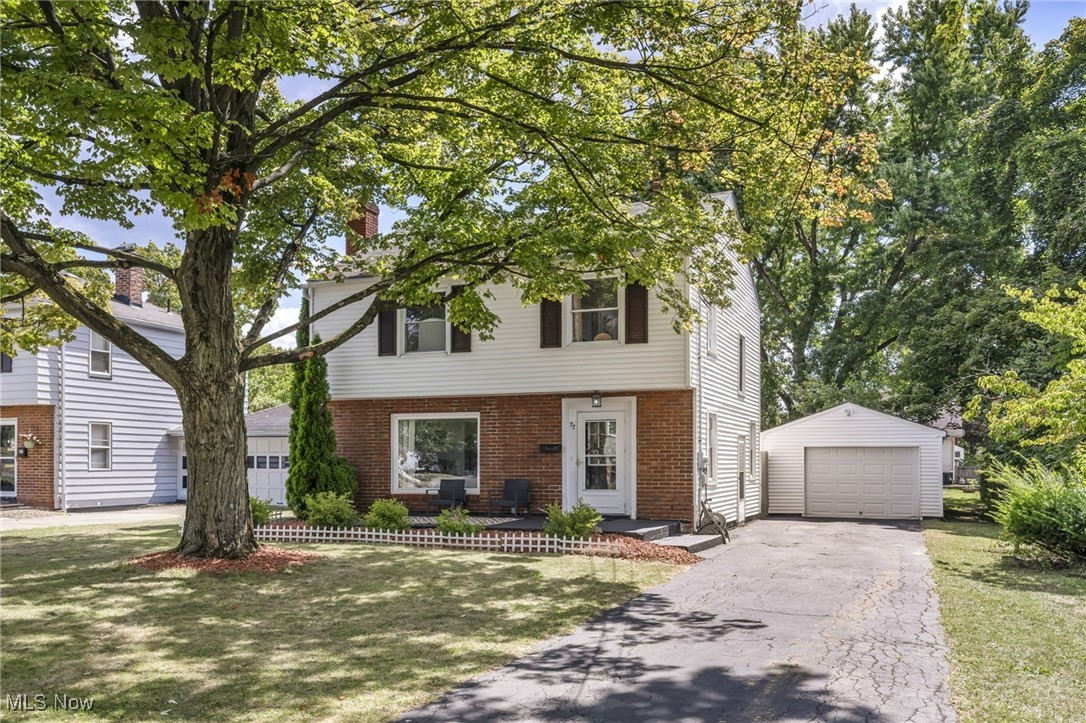 Beautifully updated and move-in ready Colonial in the award-winning Boardman School District! This home offers 3 bedrooms, a fully renovated bath, and 1,331 sq. ft. of living space - extra square footage compared to similar homes in the area - plus a newly built back deck and a private fenced yard. The large eat-in kitchen features updated cabinets, countertops, tile backsplash, a shiplap ceiling with recessed lighting, and a dining area with plenty of room to gather. A welcoming family room has a cozy fireplace and a picture window that floods the space with natural light. A sliding barn door connects the dining area to a versatile bonus room, perfect for 1st-floor home office, recreation room or den (currently being used as a playroom), with access to the deck and spacious backyard. There is also a patio area adjacent to the deck and detached 1-car garage. Recent updates include: Replaced furnace and A/C (2022), removed wall between kitchen and dining room and fully updated kitchen including cabinets, countertops, backsplash, ceiling shiplap, and recessed lighting (2024), replaced washer/dryer, stove, and refrigerator (2021), replaced dishwasher and microwave (2024), installed deck, fence & exterior lighting (2024), 2 windows in bonus room (2024), updated full bath (2024), replaced flooring throughout (2024), installed custom baseboards, replaced all interior doors, and installed barn door between dining area and back room (2024), replaced siding on back room of house (2024), painted throughout (2024), and much more! A detailed list of updates is available upon request. INCLUDED: ALL kitchen appliances, washer, dryer, refrigerator/freezer in the garage, window treatments & backyard playset. Conveniently located near I-680, US-224, US-422, I-76, shopping, restaurants, parks, and other local attractions. This home is a must see!