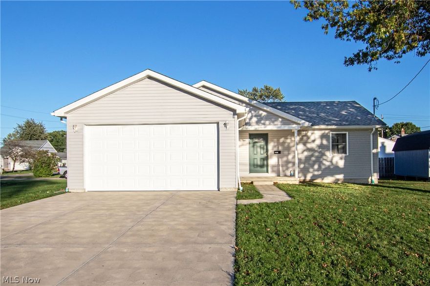 Built-in 2019 this modern ranch home located in Brook Park is practically still new construction! Effortlessly move right into this 3 bedroom, 3 full bathroom gorgeously maintained home. As you approach the home you will notice the large two-car attached garage with plentiful storage and inviting curb appeal. Entering through the front door you will notice the home's open concept layout with soaring vaulted ceilings and plentiful windows for an abundance of natural lighting. The flooring all throughout the home is luxurious high-end vinyl plank flooring. The gourmet kitchen features an expansive peninsula offering bar-style seating with granite countertops, tons of cabinet space including a pantry area, and a gas hook-up for a gas stove. The kitchen is open to the dining area with sliding glass doors out to your backyard. Enjoy the convenience of living all on one level with a full bath to your right of the two spacious guest rooms. The owner's suite is sizeable with a walk-in closet a