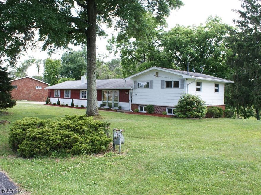 Cute 3 bedroom home with first floor family room. Features include a large lot, rec room and office in the finished basement. Enjoy the convenience of being close to town, yet the beauty of the country. Home is move in ready.  Office in the basement has been used as a bedroom in the past.  2 car garage.  Family room, wet bar, and garage added sometime between 78-81.