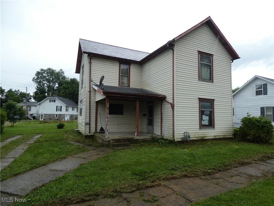 This well priced two story is solid and  offers 2 large bedrooms, 1.5 baths, first floor laundry, a spacious kitchen, newer gas forced air furnace, vinyl siding, a large level lot and LOTS of potential.
