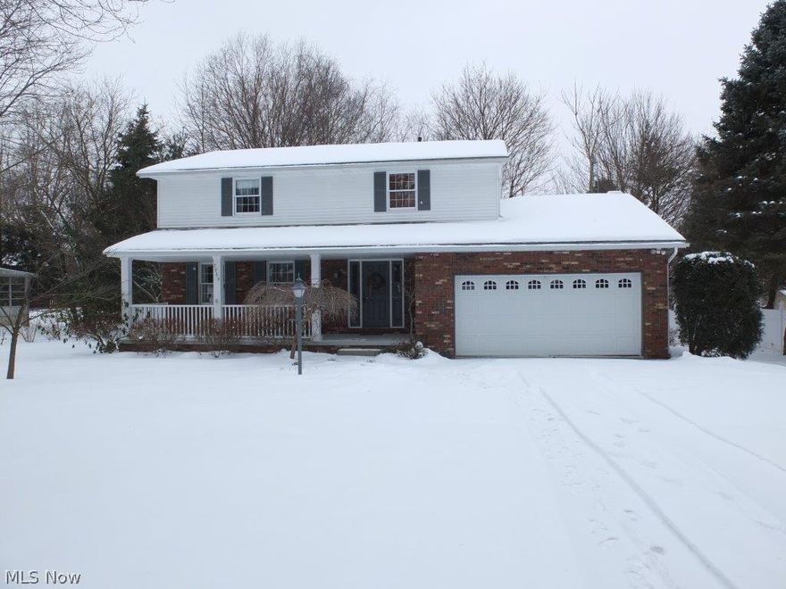 Welcome to this centrally located, beautiful four bedroom colonial in Jackson Township. Oversized front porch leads into your nice open foyer. Gorgeous hardwood floors flow from the formal living room into the dining room. The spacious kitchen is fully applianced with stainless steel oven, range, refrigerator, dishwasher and over the range microwave and has a nice eating area with a wet bar, pantry, tile backsplash and breakfast bar too! Family room with nice built in shelving around the fireplace with wood burner. 4 good sized bedrooms with tons of closet space including master suite with 2 closets and private full bath. Recreation room in lower level. Enjoy the tranquil half acre yard on your nice custom build, tiered deck. Fully applianced including washer and dryer! Newer high efficiency furnace.