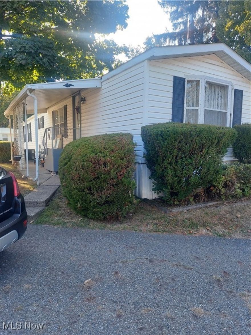 Well maintaned Mobile Home.  Located in a quite well established  55 plus community.  Large living room with built- in cabinets. Large kitchen with eating area.  2 bedrooms.  2 Full baths.  Laundry room . Kitchen appliances to stay Refridgerator and Range.  Washer and Dryer to stay.  New roof, Gutters and 2 New skylights  withre remote open and close Shades installed 09/25/2025