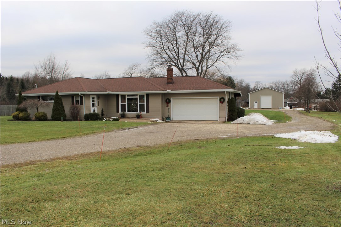 Welcome Home to this adorable updated and well maintained ranch featuring 3 bedrooms and 1 bathroom. The home boasts several updates including a new look in the kitchen with fresh paint and new backsplash, a completely remodeled bathroom, custom cabinetry framing the beautiful brick fireplace in the living room and updated trim throughout. Enjoy the covered patio outside, great for entertaining or just relaxing. There is also a new 33 x 40 pole barn with electric and heat. Other updates include a newer roof, siding, furnace and hot water tank. Note: there is hardwood flooring under all of the carpeting. Easy access to freeway and located close to UH Medical Hospital (Geauga Hospital).