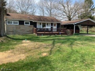 Great Ranch home on corner lot with a nice yard. Many opportunities especially with the additional apartment attached. Also there is a metal pole building for storage.