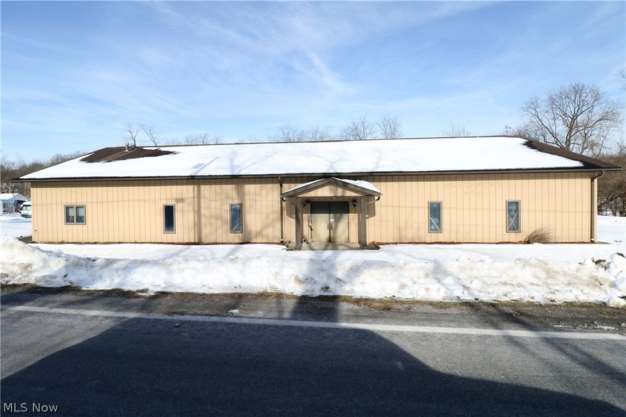 Huge industrial building with many possibilities such as Retail, Party Hall, offices, and more or storage. Large main room with residential garage door. Full functioning kitchen off the main room. Two separate restrooms with multiple toilets and a sink. And a private office. Large Asphalt Parking lot. Total property almost 1 acre. Former Unionport VFW