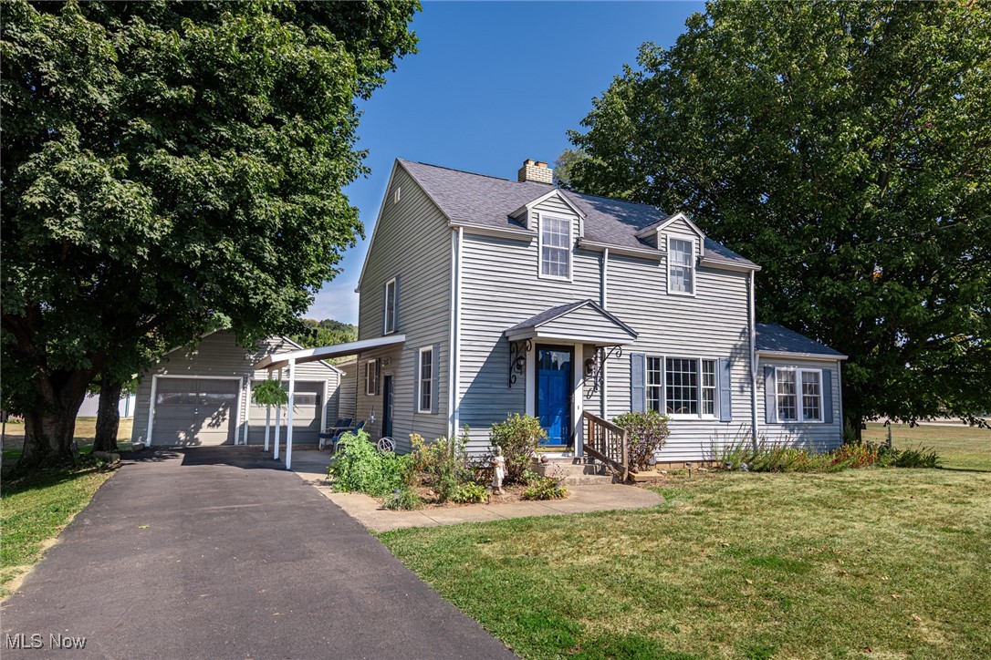 This new listing showcases a beautifully remodeled kitchen with Corian countertops, an island, and custom-built cabinets, along with a spacious pantry featuring pull-out shelves and drawers. The hardwood floors lead to a stunning great room with a huge 31x19 vaulted ceiling, skylights, and abundant Anderson windows that open up to a large private deck and a fantastic outdoor grilling and party area.
The formal dining room includes a cozy fireplace and retains the charm of the original hardwood floor. There's also a convenient private office or playroom. The main floor is completed with a laundry area and a full bathroom, epitomizing first-floor living at its finest.
Upstairs, you'll discover three comfortable bedrooms along with another full bathroom. The partially finished basement has the potential to become a fourth bedroom and even features a concrete fallout shelter.
Additionally, the property boasts a 2-car garage, a large flat yard, a garden, shade trees, and a circular driveway. There's a sizable 54x32 shop/garage with a 14 ft ceiling and 12 ft doors, featuring 5-inch concrete floors and fully insulated walls and ceiling. Two more large storage buildings are available for extra equipment and storage as well.
Public water and sewer services are available if desired. The home is equipped with high-speed internet, a reverse osmosis water treatment system, copper plumbing, gas heating, and central air conditioning. This property sits on 1.5 acres, conveniently located between the Career Center and New Point Church.