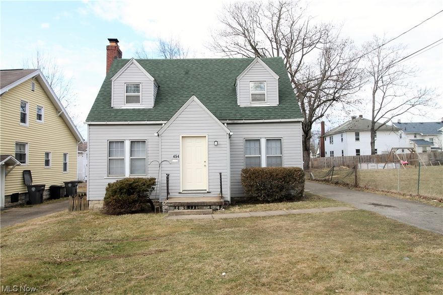 Welcome to this charming two bedroom, one and half bath home. Freshly painted throughout. Bright living room has a fireplace with mantle and is open to the dining room and kitchen. Two large bedrooms upstairs with a full bathroom. The basement is unfinished. There is a one car detached garage.  Large fenced in backyard, great for entertaining, or just relaxing. Move in ready!