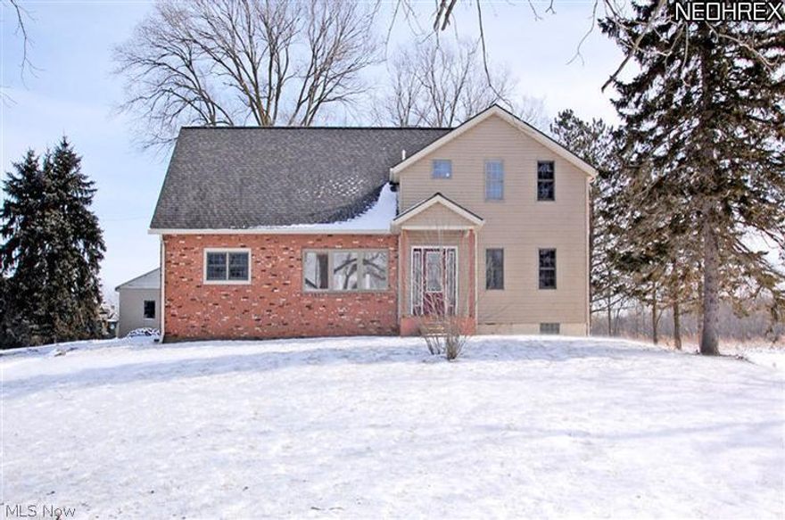 Updated and renovated century home situated on over 5 acres of pure serenity. This outdoor paradise includes large pond for fishing and recreation, large barn with horse stalls and even a detached garage for all your toys. Inside the newly renovated home, you will find a beautiful handmade stone fireplace with pellet-stove insert,  ground-up remodeled kitchen and three fully renovated bathrooms! Old world craftsmanship like you've never seen before...just look at the photos, shock your friends with the gleaming hardwood floors, over-sized trim and solid - real wood magnificent doors! Sumptuous master retreat is perfect for unwinding after a long day of work. Master features HUGE walk-in closet and the bath is out of this world with separate jetted tub, full height ceramic tile shower and the finest of fixtures and appointments.