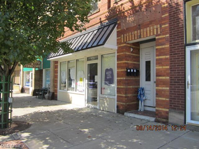 Priced to Sell!! Owner retiring...take a look at this updated, well maintained 2 story brick commercial building. Fully rented. First floor consists of storefront with 8 rooms, one bath, and one apartment with appliances. Second floor has 3 apartments equipped with appliances, coin operated laundry room. Full basement with lots of storage.