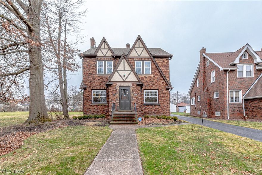 Welcome to this stunning all brick colonial in Garfield Heights-located across the street from Garfield Park Reservation. As you enter the spacious living room, notice the wood burning fireplace, a spacious eat-in-kitchen, and a separate dining room full of natural light. This stunning kitchen welcomes you with full appliances, laminate floors and an exceptional eating area. The 2nd floor boasts 4 bedrooms and a full bathroom. The 3rd floor has an oversized bonus room which would make a great teen suite. The property has a 2-car garage, brick patio and fenced in yard. Enjoy the park-like setting all year round. Updates new hot water tank (11/22), newer windows, glass block windows in the basement and new carpet in the living room and dining room. This home is being sold AS-IS. Do not miss this stunning home in Garfield Heights!