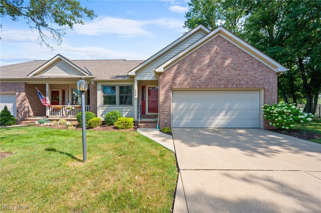 Welcome home to this well updated, secluded townhome that provides all the amenities you could need. This 2/3 bedroom unit with 2 full baths & 2 half baths is sure to wow you! Walk in to be greeted with tasteful modern touches and an open concept floor plan with new LVP flooring in all the living spaces. Eat-in kitchen boasts hardwood cabinetry, stainless appliances, dining area, pantry, new fixtures and over looks the great room. Spacious great room features vaulted ceilings, gas fireplace, lots of natural light, room for a desk or formal dining table and plenty of room to entertain or relax. Cozy morning room provides vaulted ceilings, room for a full size table, ceiling fan and access to you private deck via a newer sliding door. Spacious 1st floor owner suite boasts a full updated bath with new dual vanity, commode, walk-in shower, linen cabinets, and a walk in closet with clothes organizer. Updated half bath and 1st floor laundry room with storage round off the first floor. Upstair you will find a large 2nd bedroom with an on suite full bath providing updates and a large closet. Loft area is large enough that it can be utilized as a second living space or can be used as an office or den area. Loft can easily be converted to a 3rd bedroom. Downstairs features another finished living space with new carpet, modern 1/2 bath, and storage galore! Roomy 2 car garage features attic access, water and drain, new opener and storage room. Enjoy your backyard on the secluded deck and utilize the large green space. Updates include new vinyl windows 2023, new H2O tank 2024, new owners bath 2025, new LVP floors 2022, new roof 2021, and more! Close to shopping, restaurants, and highway access Schedule a tour today as this one wont last long!