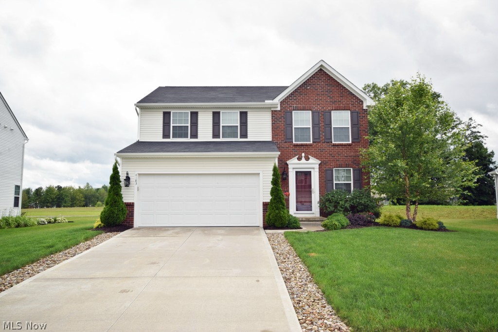 Built in 2010, this colonial in the Sterling Green neighborhood of Brimfield has a welcoming foyer which leads to an open concept floor plan with a great room, eat in kitchen, and morning room. A full basement offers endless possibilities for additional living space and storage. The upstairs features a master suite with walk-in closet and bath. Second floor laundry eliminates the need to climb stairs with heavy baskets. This home is move in ready! This property features a great space for all of your outdoor activities. It showcases an established lawn with beautiful landscaping and deck with bench seating. This home is located close to the exciting new downtown Kent development while providing for the quietness of suburban living. Easy access to I-76 makes getting to Akron, Cleveland, or Youngstown a breeze! Don't wait 'til this beautiful home is sold! Call today to schedule your showing!