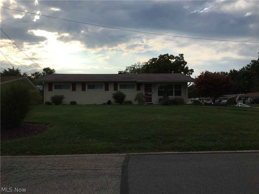 This Large 1800 sq ft lovingly cared for ranch has many updates and upgrades including updated electrical throughout home, new hot water tank, updated interior, granite counter tops with neutral back splash, laminate hard wood floors, newer carpeting throughout, updated bath, spacious master bath with large closet and updated master bath Abundant closets, oversized pantry off 22X23 family room with fireplace. Home features open floor plan, large private covered patio and fenced yard. Close to playground and shopping.