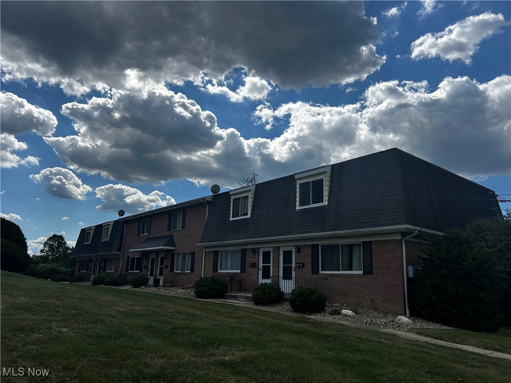 This well-maintained 2-bedroom, 1.5 bathroom townhome offers comfort, style, and convenience in a desirable location. You will appreciate the beautiful hardwood throughout the main living areas. The spacious carpeted bedrooms provide ample closet space. Enjoy outdoor living with a private back patio accessible through a sliding glass door, as well as a covered carport for convenient parking. The full private basement includes laundry hookups and plenty of storage space. Located in the Copley-Fairlawn School District and close to shopping, parks, restaurants, and major highways. One month's rent + one month's security deposit required. Additional fees apply for pets. Don't miss out on this great opportunity - schedule your showing today.
