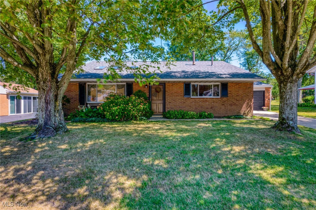 A spectacular opportunity to make this beloved home yours! Ideal location backing to Kimpton Middle school on a quiet street. This home has a beautifully updated kitchen and spacious layout. Bright family room and large eat-in kitchen with added lower level living room and full bath. The walk-out lower level leads to the oversized three car garage and private rear yard. There are three bedrooms with beautiful hardwood floors and a full baths upstairs. You won't want to miss this charming opportunity, call for your private tour today.
