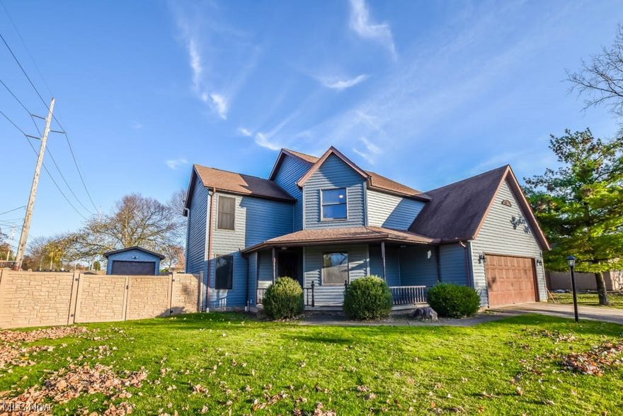 This beautiful open concept two-story colonial is located in a desirable neighborhood, just minutes away from local schools and shopping. With its spacious layout, 3 bedrooms, 2.5 baths, and large backyard, this home is perfect for growing families or those that love to entertain. Upon entering, you are greeted by an inviting living room with dark hardwood floors, recessed lighting, and a cozy gas fireplace. The living room flows seamlessly into the dining room, which features large windows and plenty of space to entertain. In the kitchen you'll find stainless steel appliances, granite countertops, soft close cabinets, and room for casual dining next to the sliding glass door leading to the outdoor patio. All three bedrooms are located upstairs and feature ample closet space. The master bedroom has a walk-in closet and a private bath with a bathtub and shower with a tile surround while the secondary bedrooms share access to the full bath in the hall. The full-sized basement with Nature Stone flooring is perfect for storage or it could be finished for more living space. Outside amenities include a spacious backyard with a tall privacy fence, a large stamped patio area with a fire pit, and an 11' x 23' single stall garage/outbuilding with electricity. There is also an attached two-stall garage with two additional parking spaces in the driveway. Don't miss out on this amazing opportunity to own a beautiful and spacious home in a great location! Schedule a showing today!