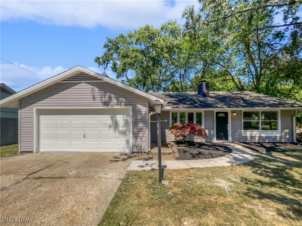 This beautifully updated single-level ranch offers 3 bedrooms, 1.5 baths, and a spacious layout. Step inside to find fresh updates throughout, including new shaker-style kitchen cabinets, sleek countertops, stainless appliances, and updated flooring. The modern living area features a fireplace, creating a warm and inviting space for relaxing or entertaining. Each bedroom offers ample space, and the updated bath adds a touch of modern convenience. Situated on a large lot, there’s plenty of room to enjoy outdoor living, gardening, or a good . A 2-car garage adds extra storage and functionality. With its tasteful upgrades and classic ranch layout, this move-in ready home offers both charm and comfort in a desirable setting... 100-Day Home Warranty coverage available at closing