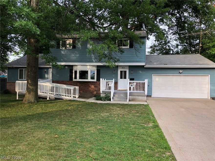 Looking for a house with a "stunning in law suite"?  Well this home has it! Five bedroom, three full bath and over 2,500sq ft you will be very impressed with this well maintained home. The in-law suite has its own air, heat, and sump pump. Front and rear entrance. Also handicap accessible. Large kitchen and dining room area. Other features include new carpet throughout, lifetime Stanek  windows, rear deck. This house in a great neighborhood wont last long. Set up a showing today!