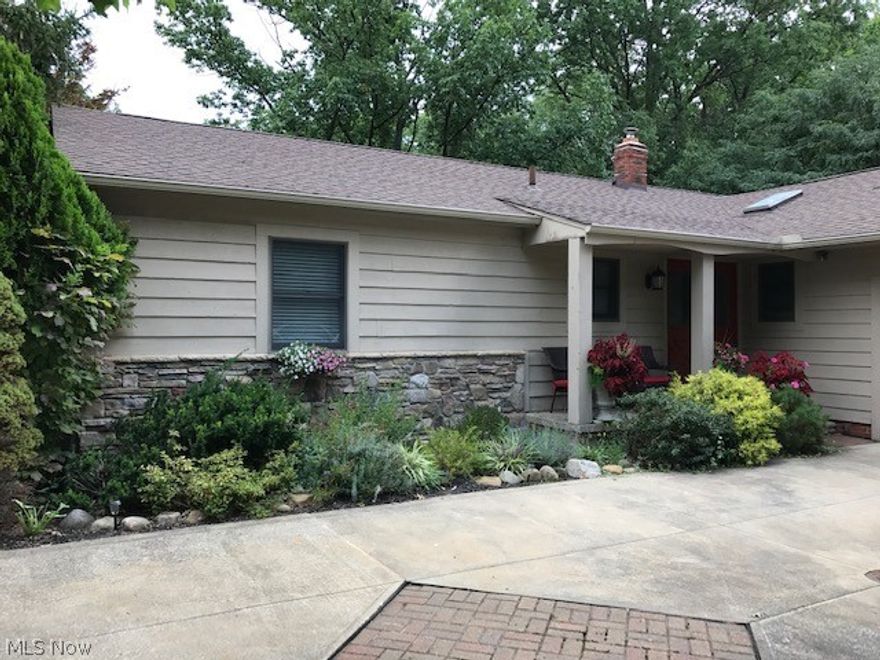 Beautiful well maintained ranch w open floor plan set back & hidden on over an acre of a meticulously landscaped and park-like lot*** Enjoy the wooded view overlooking Pete's Pond Preserves from the 19x28 stamped concrete patio w/waterfall & surrounded by lighting that's perfect for your night time entertaining***This home offers spacious rooms with a 21' eat-in kitchen w/all newer appliances and skylight, 7' breakfast bar & beautiful laminate wood flooring, dining area looking out through sliders to the Gorgeous Park-like yard, 17' living room, 3 spacious bedrooms, 2 full baths***First floor laundry***Finished basement offers a 39' rec/family rm, cedar closet, workshop, glass block window, newer gas furnace with wood back up & newer hot water tank***Newer roof, windows &  siding***2 car attached***Open flow floor plan with natural lighting throughout!