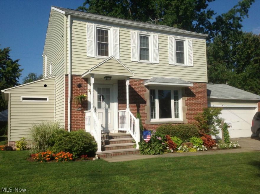 Well-maintained 3 bedroom colonial with toilets on all 3 floors. 2 car attached garage on a double lot. 1329 square feet of living space on a friendly residential street. Full basement with laundry area, workshop and finished rec area with gas heater for additional comfort. Updated kitchen ('13) with glass mosaic backsplash, large counter areas, lots of cupboard space, ceiling fan and refrigerator sunken into wall to expand the room even more! Some appliances stay. First floor bathroom added in '13 with large counter and closet space and heated ceramic tile floor. Hardwood floors in dining room, living room and all bedrooms. Gas fireplace in living room. All windows in home new in '10. 2 bedrooms have ceiling fans. Breaker box updated in '12, hot water tank replaced in '06 and roof new in '08. Has central air, 2-car garage with attic storage space, attached enclosed air-conditioned sunroom and brick patio. 20 minutes to downtown Cleveland.