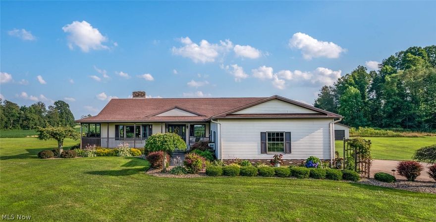 Absolutely gorgeous property! Custom built and designed with attention to every detail.Quiet country living on just over 6 acres with a quality built ranch home. 3 bedrooms & 3 baths. Open floor plan, spacious kitchen offers granite counter tops, comes completely equipped with stainless steel appliances with breakfast bar and beautiful oak cabinetry. The great room features a stunning brick fireplace which is open from 2 sides. Huge master suite holds walk in closet, holds a walk in closet and also offers a huge master bath that boasts a Jacuzzi tub & separate oversized shower. Fresh paint & all new toilets & faucets. 1st floor laundry room. Partially finished basement with a bar. Freshly painted throughout. Ease of cleaning with central vacuum system. Step out of the French doors off dining room onto a enormous wrapped around porch stepping down to stamped concrete patio. Spectacular views surround this entertaining area perfect for a fire pit. Do you have horses or are you an animal