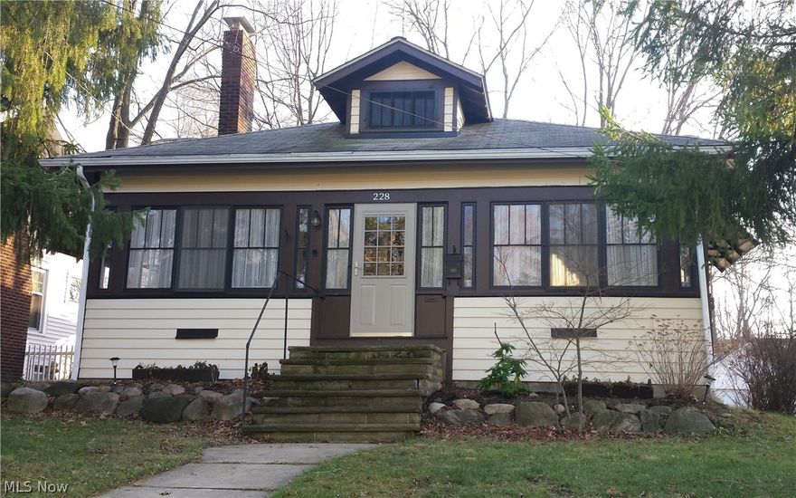 Nostalgic One Story Ranch-style home built in 1917 with Two Lots containing .367 Acre located only Two Blocks from Medina's Historic Downtown District!  This lovely home features approximately 1,176 sq. ft. of first floor finished living space complete with a galley-type Eat-in Kitchen and Dinette.  Formal Dining Room has Wood Flooring and Crown Molding.  29'X12' Living Room includes a Brick Gas Fireplace with Hearth, Wood Mantel & Built-in Custom Cabinets.  The interior living space expands into a 29'X8' Enclosed Front Porch w/vinyl flooring & wood ceiling, adding 232 sq. ft. to the house.  Two bedrooms and one full bathroom are located on the first floor.  Partially finished lower level includes a one car side load garage, fruit cellar, utility room and plenty of space for adding a Rec Room.  Large Detached 3 Car Garage (900 sq. ft.) with one OHD Door with opener/remote, Two Carriage Doors, 15-course block height and new Metal Roof is included on the additional lot that expands the s