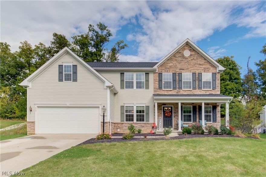 Everything you’ve been looking for in Wadsworth! Welcome to this beautiful 6+ bedroom/4 full bath 3850 sq ft Colonial w/ front porch located in Bayberry Estates. First floor open concept living features a generous family room, spacious kitchen w/ granite countertops & new vinyl plank flooring, SS appliances, large island and an extra large morning room for your farm house table! Off the front foyer there is a large home office with French doors and a formal dining room. A generous sized bedroom (perfect second office) w/ brand new carpet and a full bathroom complete the first floor. The second floor boasts a large open hallway with 5 bedrooms! A spacious Master suite with en-suite bathroom, 4 additional nice sized bedrooms, large bathroom off the hallway, a 2nd floor Laundry room plus 2 hall linen closets for storage. There is a full basement that is partially finished and has a studio apartment style/guest suite with egress window (7th bedroom possible), kitchenette with range, refrig