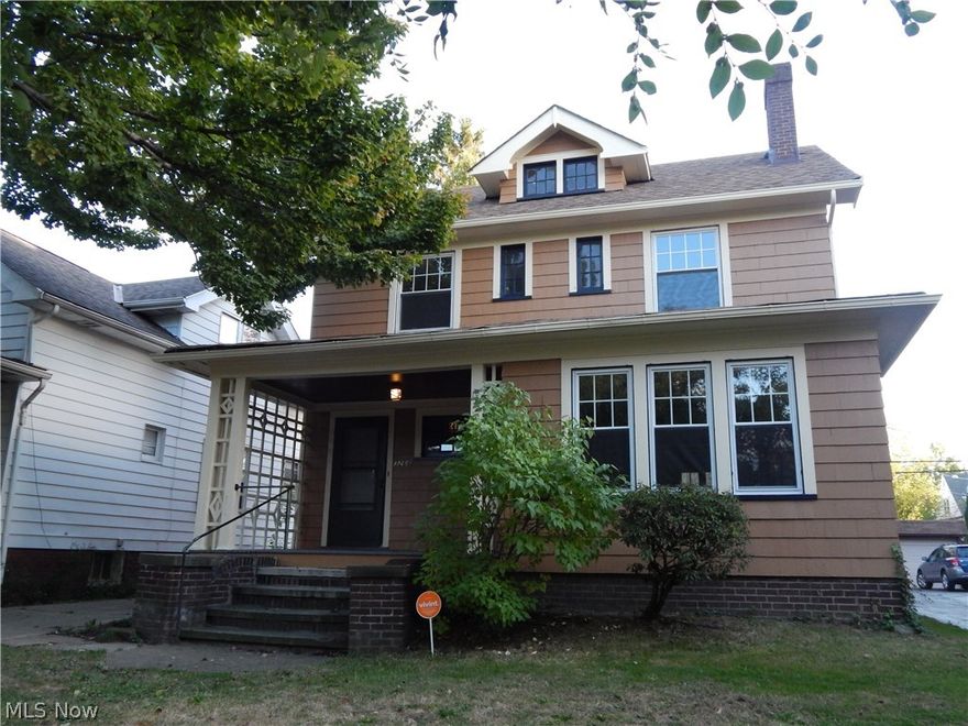 This Cleveland Heights colonial is waiting for you! Complete with a traditional living room with loads of space, a fireplace and a large formal dining room with built-in cabinets and natural woodwork that leads out to the backyard.  This home has been freshly painted in warm neutral tones, has new carpet throughout and a completely remodeled kitchen with new cabinets, granite countertops, a breakfast nook with extra shelving for storage.  Brand new stainless steel appliances completes this kitchen remodel.  3 bedrooms, ceiling fans, a master bedroom with a second fireplace and an updated bathroom complete the second floor. New vinyl windows. The third floor can make a 4th bedroom or bonus area of your making.  2- car garage and a convenient location close to shopping, restaurants and Cain Park.  This house is a good value for the money.  Buy with confidence this home comes complete with a home warranty.