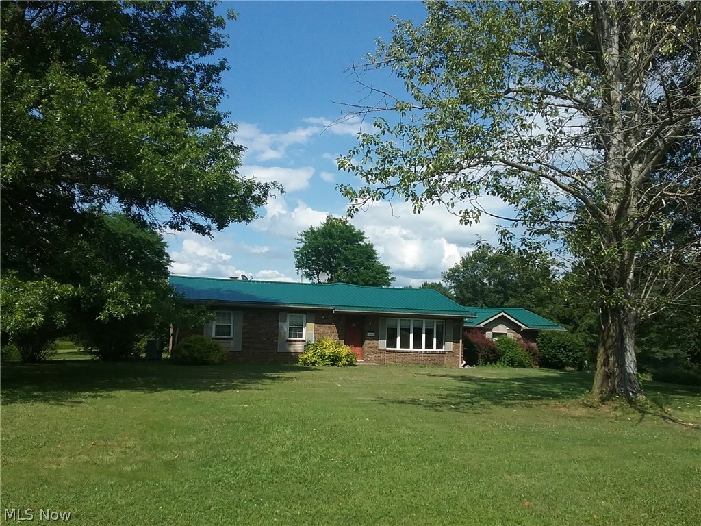 Great, little mini farm on 3.68 acres with fenced pastures and 2 stall barn and tack room. 3 bdrm, brick ranch with metal roof, 2 full baths, propane fireplace in basemen and workshop/workbench area, 1 car attached garage. There have been electric improvements throughout the house and to outbuildings/barn per seller, 6 new windows have been completed. Large back deck has new railings installed and is freshly painted with Cabot Deck Restorer added. and covered porch. New exterior drains added and basement has been drylocked. Lots of storage. Hot water heater new in 2020, AC/furnace 2010, 200 Amp Electric service. Seller has had well and septic tested by Jefferson Co Health dept. and were approved. Kitchen has lots of cabinets and storage and newer appliances that stay, stainless steel in 2019, bosch dishwasher, whirlpool stove and overhead microwave. Barn and pasture are set up for 2 horses with gates installed to allow for continuous grass growth. Tack room has room for 40 bales of