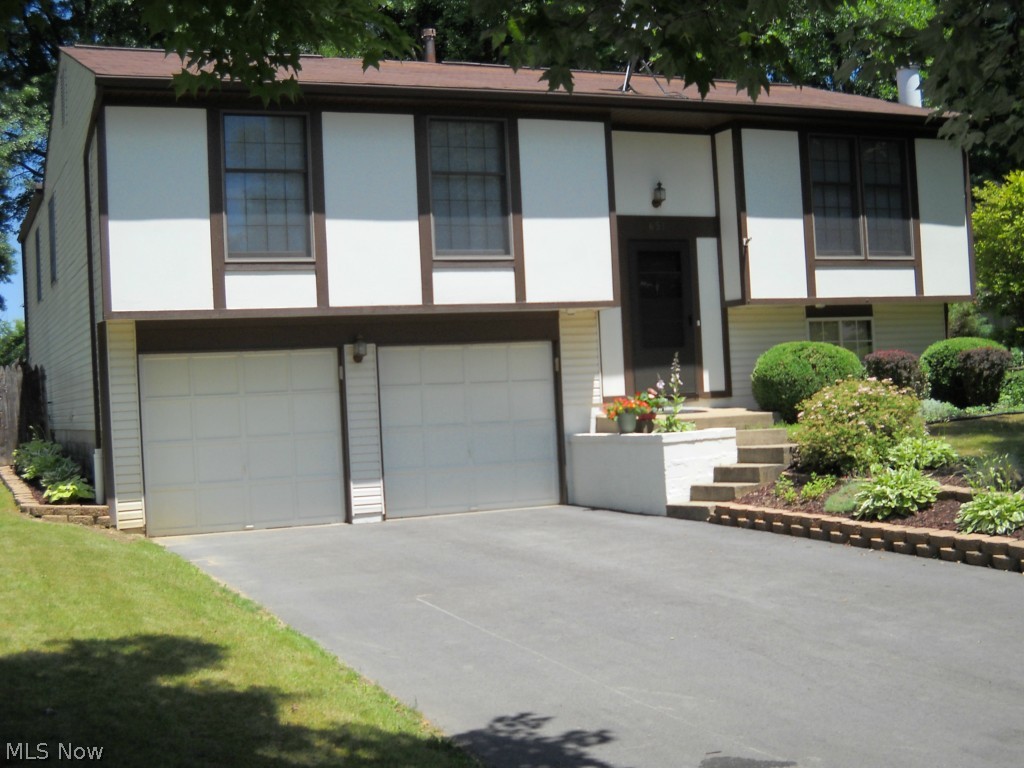 Just installed, new carpeting in bedrooms, new price 2,588 sq. ft., 4 bedroom, 2.5 bath home in the heart of Howland featuring spacious living room, formal dining room, updated kitchen with 9 x 19 bonus room leading to wood deck, lower level features family room with wood burning fireplace and dream workshop. Fenced backyard features patio and above ground pool with solar panel heat, too many amenities to mention, hurry this will not last.