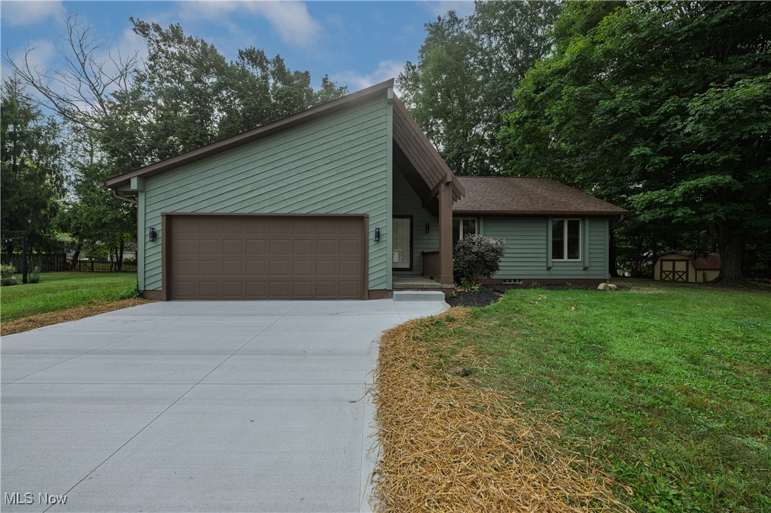Must come inside to appreciate all this totally renovated ranch has to offer. Painted inside and out, new lighting, flooring and windows. All 3 baths have been totally updated. Open concept kitchen with new stainless steel appliances, granite counters, tile backsplash, eating bar and dinette. Kitchen opens to Great Room with vaulted ceiling, wood burning fireplace and doors that lead out to a brand new deck. Master suite with master bath and skylight. Master bedroom has a patio door leading out to your private new deck. Main bath with skylight and all new fixtures. 2 More nice size bedrooms complete the main floor. Lower level has a 15x25 family room with new carpet and a play area, full updated bath, laundry and office. 2 Car attached garage with new concrete drive. Great cul-de-sac lot. Close to shopping, hospital and highway.