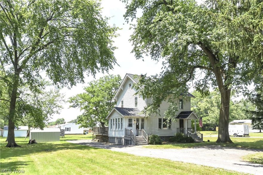 Welcome home to 7636 York Rd, where wonderful city meets country living, this Parma colonial is set to impress. On the first floor you will find large and inviting main rooms with gleaming hardwood floors, formal dining room and bright kitchen with tons of cabinetry and access to deck and backyard. Side porch is glass enclosed, great as a mudroom or possible plant room. 
3 large size bedrooms on the second floor, and finished 3rd floor makes for a wonderful 4th bedroom. 
Walk-out basement, exceptionally large lot over 33,000 square ft (3/4 acre) with potential to split, fence and/or add a huge out building. Nothing to do here but move right in and enjoy. Numerous updates were made to save you money and peace of mind for years to come - new tear off roof in 2022, Newer HVAC system, New electric panel, new electric line from street and exterior mast. New hot water tank and plumbing updates. Great proximity to restaurants and stores, Valley Forge High school and Tri-C West.