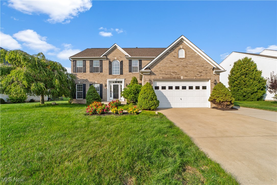 Spacious 4-bedroom, 3.5-bath Colonial in Avon Lake's desirable Hunt Club community. Features include a two-story foyer, main-level laundry, and an open kitchen/dining area with glass door to a large stamped concrete patio, perfect for entertaining. On the second floor you will find a large primary suite with soaking tub and shower plus a walk in closet. A full finished basement provides plenty of additional space for recreation, storage or a potential guest suite with a full bath. Ideally located near Crocker Park, Avon Commons, and Learwood Square shopping, with easy access to Walker Road Park by bike or foot. A perfect blend of comfort, convenience, and location!