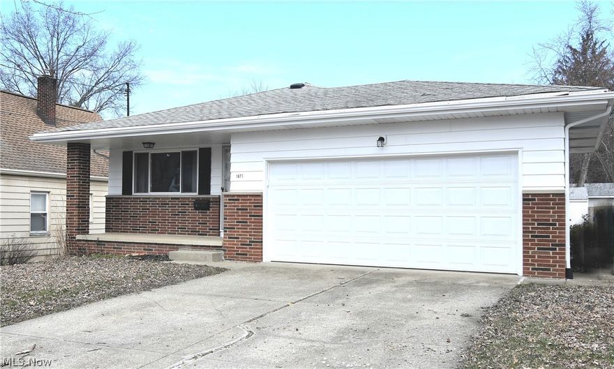 Welcome to this maintenance free living Ranch.  Great front porch leads you into a large living room with hardwood floors. 
Large eat-in kitchen which is a Chef's dream with new cabinets, countertops, dishwasher, garbage disposal, microwave, refrigerator and new
flooring completed in 2018.  Three bedrooms with a half bath off the Master Bedroom.  The lower level features, modern furnace,
updated electric, new sump pump 2018 and partially waterproofed basement to add your finishing touch and low maintenance..    The entire home has been painted inside and out.  New light fixtures throughout home.  Two car attached garage.  Walk to restaurants downtown and in the neighborhood.   Easy access to downtown Akron and surrounding communities.  This won't last long....
Call for your private showing.
