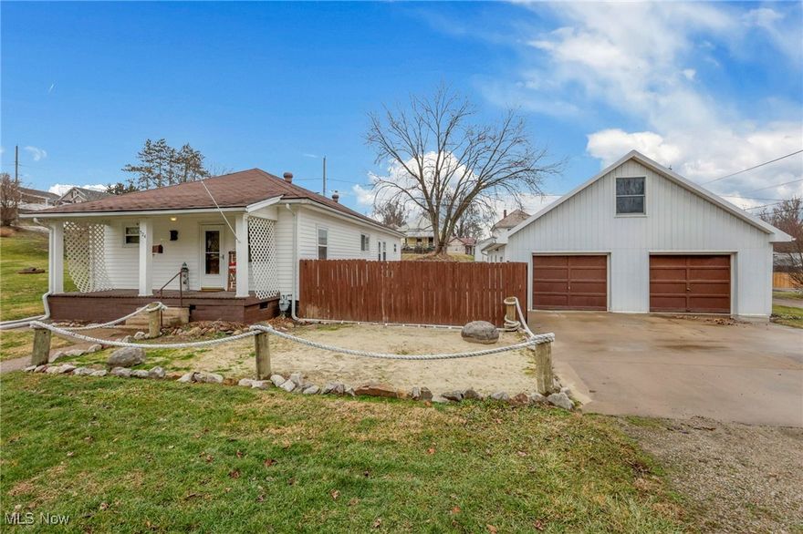 Move-in-ready home offering 4 bedrooms, with one currently used as an office/gaming room featuring a built-in desk. The bathroom was completely remodeled in 2020. The spacious kitchen features upgraded flooring, oak cabinetry, stainless steel appliances, and a generous pantry. A first-floor utility room provides abundant storage. The walkout basement adds exceptional functionality, featuring extensive built-in shelving and ample space for additional storage, a workshop area, or hobby space—ideal for keeping everything organized while still offering flexibility for future use. Outdoor living includes two concrete patios and a fenced in side patio with a privacy fence, perfect for relaxing evenings. Additional parcels totaling approximately ½ acre provide room for entertaining, grilling, and a fire pit, along with mature fruit trees including 4 apple, 2 plum, and 1 pear tree. A detached 4-car garage offers abundant space and includes a loft bonus room and a full bathroom—an outstanding bonus.